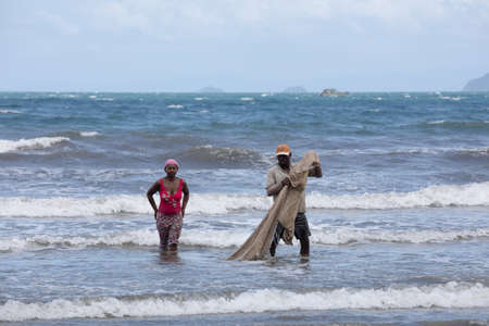 MAROANTSETRA, MADAGASCAR OCTOBER 19.2016 Native fishermen fishing on sea, using traditional technique pulling net from boat. Life of indigenous peoples in countryside. October 19. 2016, Madagascarのeditorial素材