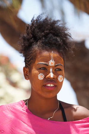 ANTSIRANANA, DIEGO-SUAREZ, MADAGASCAR, OCTOBER 29.2016, Native Malagasy Sakalava ethnic girls, beauties with decorated face on the beach in Diego Suarez Bay, Madagascar, October 29. 2016のeditorial素材