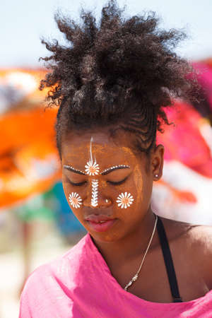 ANTSIRANANA, DIEGO-SUAREZ, MADAGASCAR, OCTOBER 29.2016, Native Malagasy Sakalava ethnic girls, beauties with decorated face on the beach in Diego Suarez Bay, Madagascar, October 29. 2016のeditorial素材