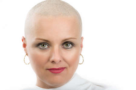 Portrait of beautiful middle age woman patient with cancer with shaved head without hair isolated on...