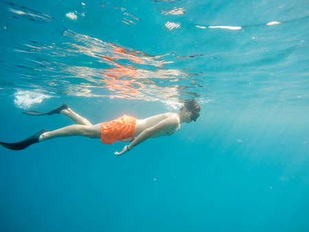 Young boy snorkel swim in red sea. Marsa alam, Egypt. Summer holiday  vacation conceptの写真素材