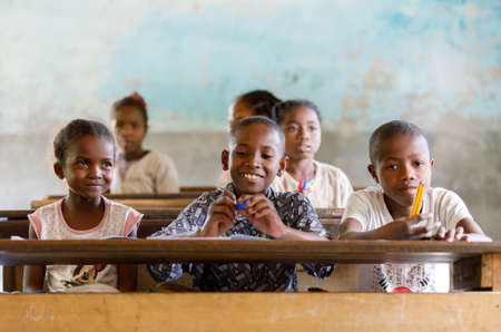 MADAGASCAR OCTOBER 17.2016: Malagasy school children students in classroom, Maroantsetra - Andranofotsy, October 20. 2016, Madagascarのeditorial素材