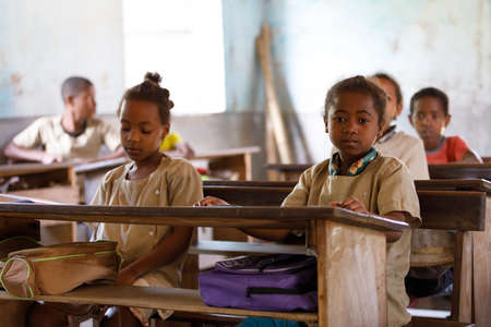 MADAGASCAR OCTOBER 17.2016: Malagasy school children students in classroom, Maroantsetra - Andranofotsy, October 20. 2016, Madagascarのeditorial素材