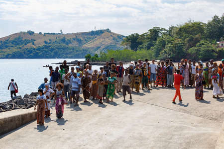 NOSY BE ,MADAGASCAR - NOVEMBER 3.2016 Malagasy woman waiting for transport ship in Nosy Be port. Nosy be, Madagascar, November 3. 2016のeditorial素材
