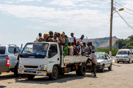 NOSY BE ,MADAGASCAR - NOVEMBER 3.2016 Traditional Malagasy peoples car transport. Many peoples in one crowded car in Nosy Be port. Nosy be, Madagascar, November 3. 2016のeditorial素材