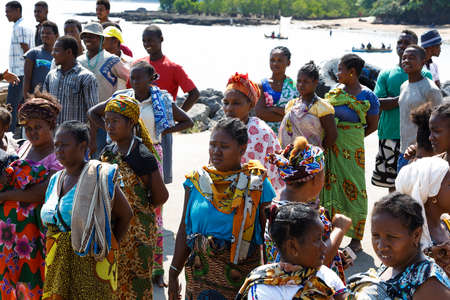 NOSY BE ,MADAGASCAR - NOVEMBER 3.2016 Malagasy woman waiting for transport ship in Nosy Be port. Nosy be, Madagascar, November 3. 2016のeditorial素材