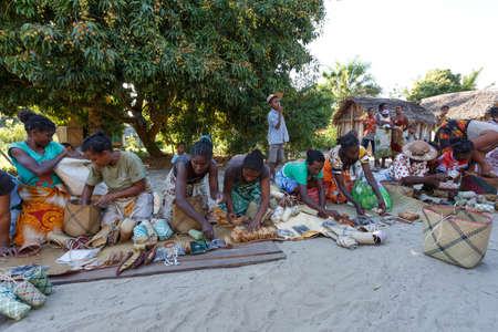 MAROANTSETRA, MADAGASCAR OCTOBER 23.2016 Malagasy woman from village selling traditional souvenir...