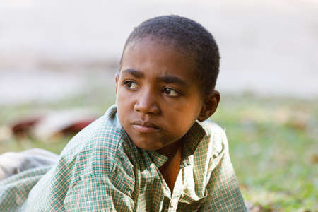 MAROANTSETRA, MADAGASCAR OCTOBER 23. 2016 Portrait of young malagasy teenager boy from near village. Maroantsetra, Madagascar, October 23. 2016のeditorial素材