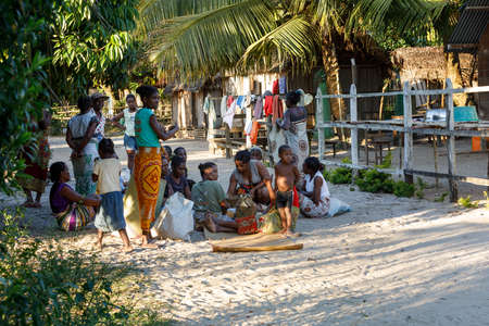 MAROANTSETRA, MADAGASCAR OCTOBER 23.2016 Malagasy woman from village selling traditional souvenir village street. Madagascar countryside scene. Maroantsetra, Madagascar October 23. 2016のeditorial素材