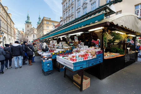 PRAGUE - December 9: Souvenir shop at famous Havel Market in second week of Advent in Christmas . Market has been continuously open since 1232,  December 9, 2017 in Prague, Czech Republic.のeditorial素材