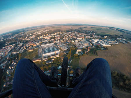Powered paragliding tandem flight, point of view to groundのeditorial素材