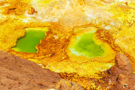 Beautiful small sulfur lakes Dallol, Ethiopia. Danakil Depression is the hottest place on Earth in...