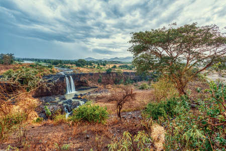 Beautiful view of Blue Nile Falls without water in dry season. Fill on the Blue Nile river. Nature and travel destination. Ethiopia wilderness, Amhara Region, near Bahir Dar and Lake Tanaの写真素材