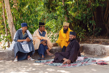 Bahir Dar, Ethiopia - April 21, 2019: Resting group of orthodox monk serving worship in Tana Haik Entons Eysus United Monastery on lake Tana near Bahir Dar. Ethiopia Africaのeditorial素材