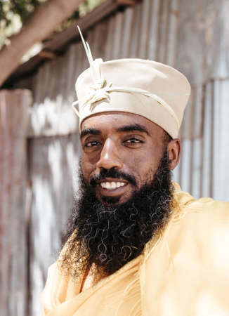 Bahir Dar, Ethiopia - April 21, 2019: Orthodox monk serving worship in Tana Haik Entons Eysus United...