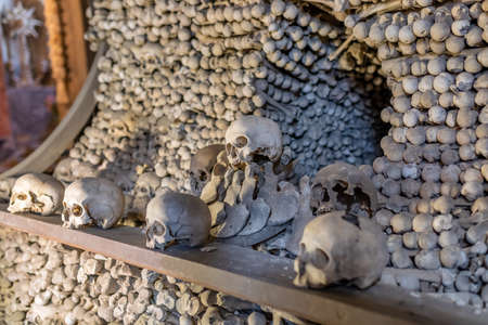 Human skulls and bones Kostnice Sedlec Ossuary, small Roman Catholic chapel, Cemetery Church of All Saints in Sedlec, a suburb of Kutna Hora in the Czech Republic. UNESCO world heritage siteの写真素材