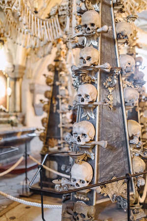 Human skulls and bones Kostnice Sedlec Ossuary, small Roman Catholic chapel, Cemetery Church of All Saints in Sedlec, a suburb of Kutna Hora in the Czech Republic. UNESCO world heritage siteの写真素材