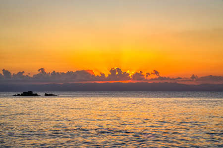 Idyllic sunset over indian ocean in Masoala national park, sunset landscape, Madagascar paradise landscape. Wilderness beauty nature sceneの写真素材