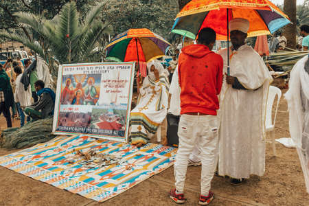 BAHIR DAR, ETHIOPIA, APRIL 21th. 2019, Orthodox Christian monk collect money on the street during...
