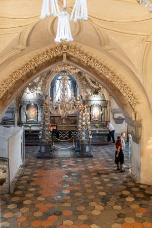Human skulls and bones Kostnice Sedlec Ossuary, small Roman Catholic chapel, Cemetery Church of All Saints in Sedlec, a suburb of Kutna Hora in the Czech Republic.のeditorial素材