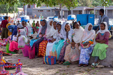 AXUM, ETHIOPIA, APRIL 27th.2019: Street market in center of Aksum, ethiopian women selling baskets in the traditional basket market on April 27, 2019 in Aksum, Ethiopia Africaのeditorial素材
