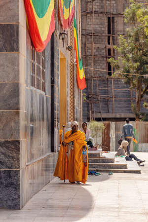 AKSUM, ETHIOPIA, APRIL 27.2019, Old orthodox priest in front of Church of Our Lady of Zion on April 27, 2019 in Aksum, Ethiopia, Africaのeditorial素材