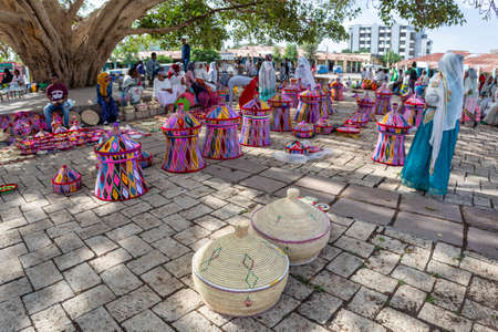 AXUM, ETHIOPIA, APRIL 27th.2019: Street market in center of Aksum, ethiopian women selling baskets in the traditional basket market on April 27, 2019 in Aksum, Ethiopia Africaのeditorial素材