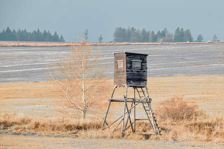 Wooden hunting tower in winter near forest, Czech Republic, Europeの写真素材