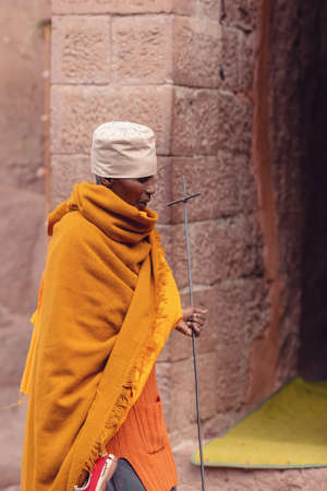LALIBELA, ETHIOPIA, MAY 1st. 2019, Orthodox Christian Ethiopian monk in front of famous Lalibela churches after Mass on May 1st. 2019 in Lalibela, Ethiopiaのeditorial素材