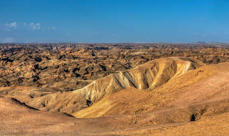 hilly landscape in Namibia near Swakopmund, looks like moonscape, Namibia Africa wildernessの写真素材