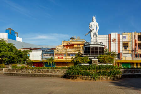 MANADO, NORTH SULAWESI, INDONESIA - AUGUST 5, 2015: Statue of a indian warrior in Manado main square...