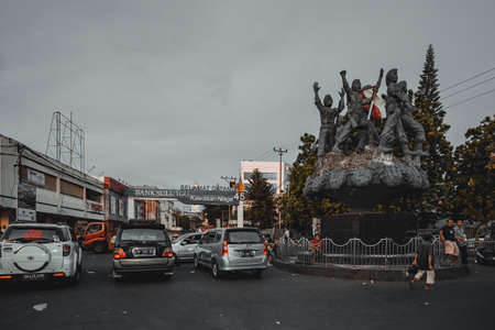 MANADO, NORTH SULAWESI, INDONESIA - AUGUST 3, 2015: Statue of a freedom fighters in Manado center on...