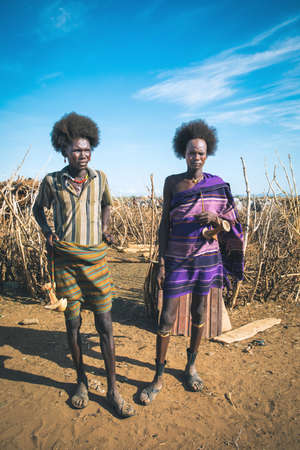Omorate, Omo Valley, Ethiopia - May 11, 2019: Portrait of man from the African tribe Dasanesh. Daasanach are Cushitic ethnic group inhabiting in Ethiopia, Kenya, and South Sudanのeditorial素材