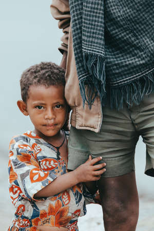 AMHARA REGION, ETHIOPIA, APRIL 22.2019, Ethiopian girl with father herdsman near Gondar city. Amhara...