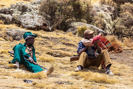 SIMIEN MOUNTAIN, ETHIOPIA, APRIL 24th 2019, Unidentified park scout with his rifle in Chenek - Simien Mountain National Park. Working as a guard is one of few possibilities of income for local people. Simien Mountains, Ethiopia, April 24. 2019のeditorial素材