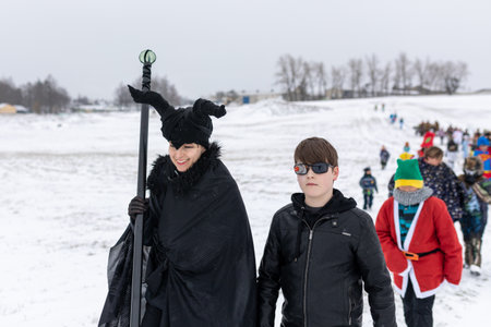 PUKLICE, CZECH REPUBLIC - FEBRUARY 29, 2020: Masopust or the Mardi Gras celebration carnival is a traditional event, ceremonial door-to-door procession. February 29, 2020 in Puklice, Czech Republicのeditorial素材