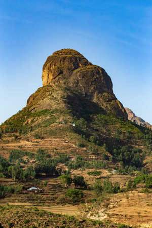 Beautiful mountain landscape with traditional ethiopian houses in valley. Amhara region near city Lalibela. Ethiopia, Africa.の写真素材