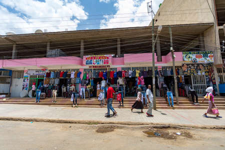 AXUM, ETHIOPIA, APRIL 27th.2019: Tigray native people in market with clothes in center of Aksum on April 27, 2019 in Aksum, Tigray, Ethiopia Africaのeditorial素材