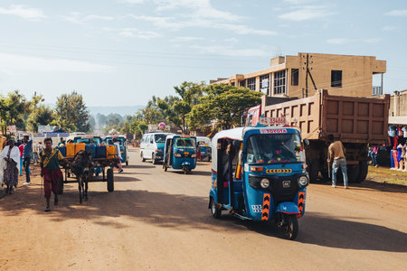 DEMEBECHA, ETHIOPIA, APRIL 20.2019. People walking on the Ethiopian street in the morning. Demebecha, Ethiopia, April 20. 2019のeditorial素材