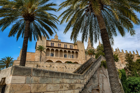 Royal Palace of La Almudaina next to cathedral La Seu. One of the official residences of the Spanish royal family. City of Palma de Mallorca. Balearic Islands Spain. Travel agency vacation concept.のeditorial素材