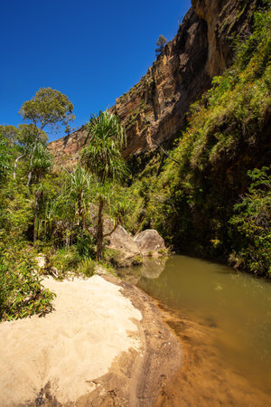 Isalo National Park in Ihorombe Region. Wilderness landscape with water erosion into rocky outcrops, plateaus, extensive plains and deep canyons. Beautiful Madagascar landscape.の写真素材