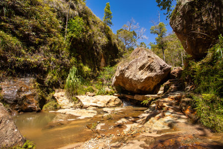 Isalo National Park in Ihorombe Region. Wilderness landscape with water erosion into rocky outcrops, plateaus, extensive plains and deep canyons. Beautiful Madagascar landscape.の写真素材