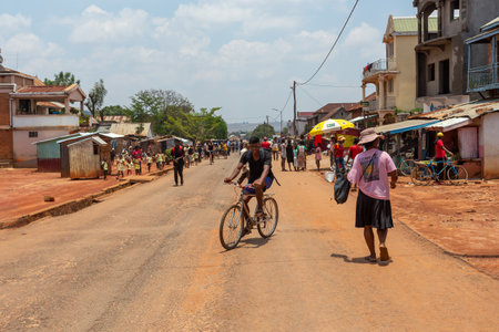 Mandoto, Madagascar - November 9th, 2022: Local residents walking and going about their daily lives on Mandoto street in Madagascar.のeditorial素材