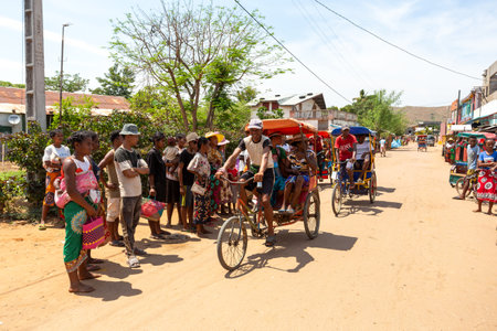 Miandrivazo, Madagascar - November 2nd 2022: A traditional rickshaw on the city streets, serving as a cultural emblem and a mode of transport.のeditorial素材
