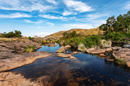 Andringitra national park, Haute Matsiatra region, Madagascar, beautiful mountain landscape. Hiking in Andringitra mountains. Sunny day with blue sky. Madagascar wilderness mountain landscape.の写真素材