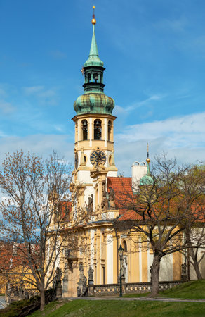 Loreta Monastery, pilgrimage destination in Hradcany, district of Prague. Cloister, the church of the Lords Birth, the Santa Casa and clock tower with famous chime. Central Bohemia, Czech Republicの写真素材