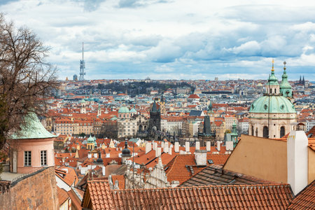 Panorama of old historic town Prague in Czech Prague, view from castle hill in sunny day, in front Church of Saint Nicholas. Central Bohemia, Czech Republicの写真素材