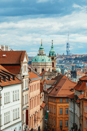 Panorama of old historic town Prague in Czech Prague, view from castle hill in sunny day, in front Church of Saint Nicholas. Central Bohemia, Czech Republicの写真素材