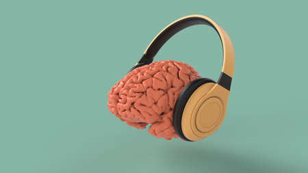 Human brain listen to yellow headphones isolated view on blue background 3d render imageの写真素材