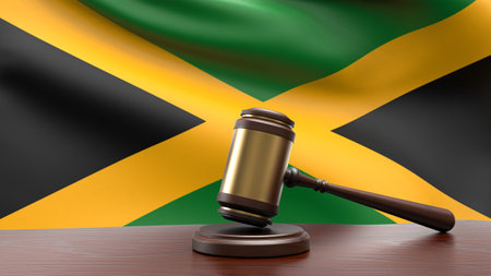 Jamaica country national flag with judge gavel hammer on court desk concept of constitutional law and justice based on wood desk table 3d rendering imageの写真素材